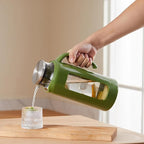 Delove Glass Pitcher with Lid & Shatterproof Shell – Heat-Resistant - Image 7